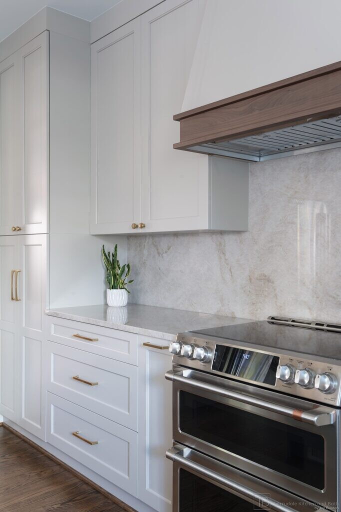 Sage and Brass – gray-green island kitchen remodel by Cherrydale Kitchen and Bath by Top Builders (photo 8)